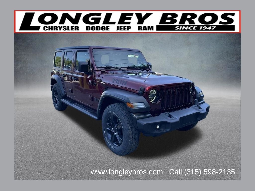 2021 Jeep Wrangler Unlimited Sport Altitude in Snazzberry Pearlcoat — front three-quarter view