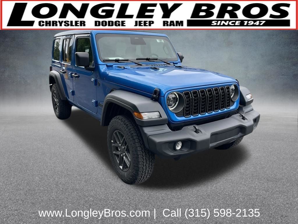 2026 Jeep Wrangler Sport S in Hydro Blue Pearl Coat — front three-quarter view