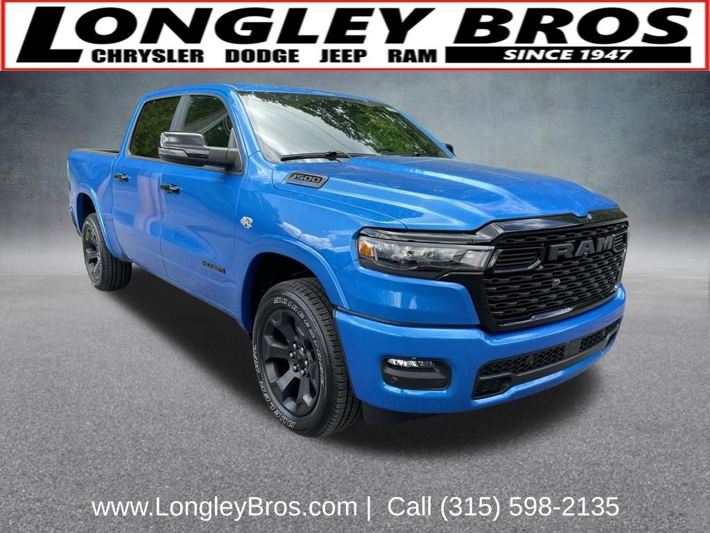 2026 RAM 1500 Big Horn/Lone Star in Hydro Blue Pearlcoat — front three-quarter view