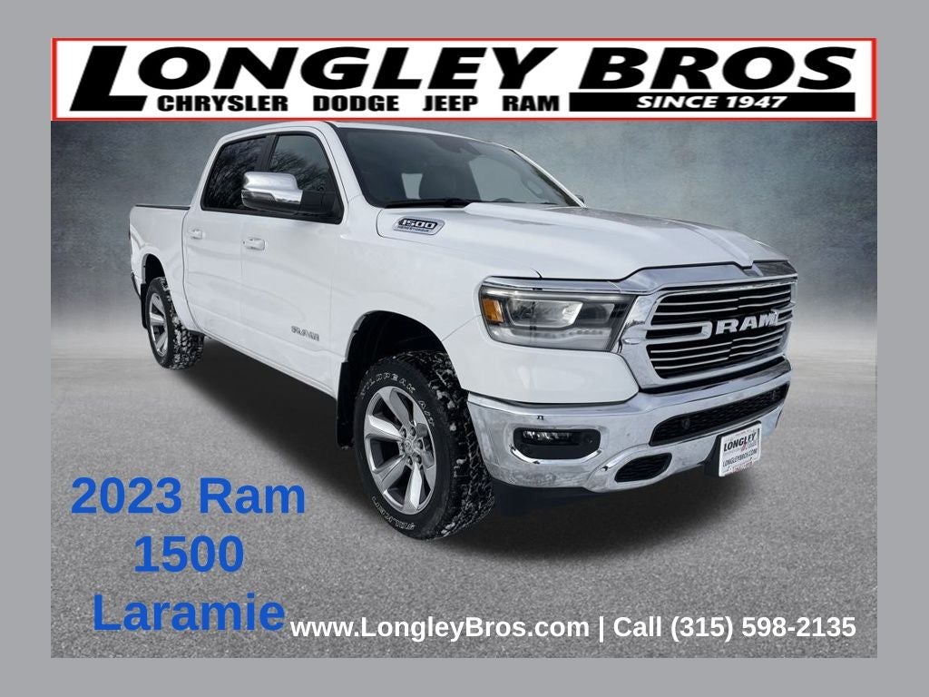 2023 RAM 1500 Laramie in Bright White Clearcoat — front three-quarter view
