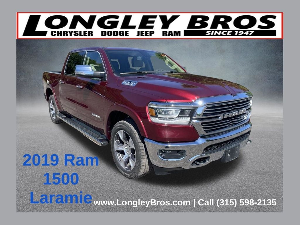 2019 RAM 1500 Laramie in Delmonico Red Pearlcoat — front three-quarter view