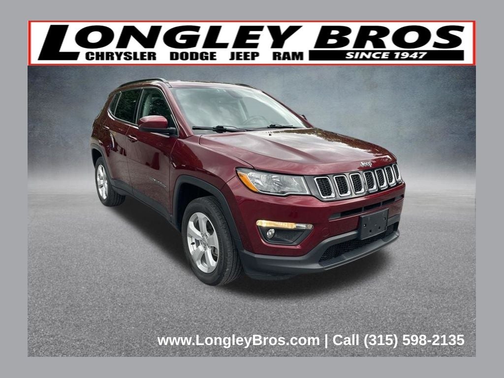 2021 Jeep Compass Latitude in Velvet Red Pearlcoat — front three-quarter view