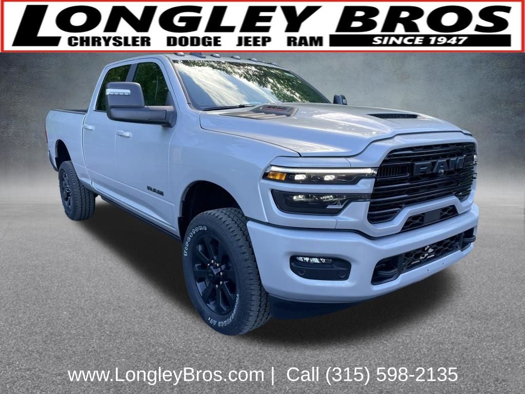 2026 RAM 2500 Laramie in Silver Zynith — front three-quarter view